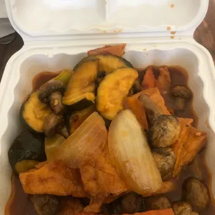 Spicy tofu on top of my egg foo young