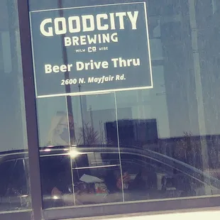 the reflection of a car in the window