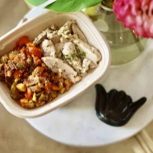 a bowl of chicken and rice