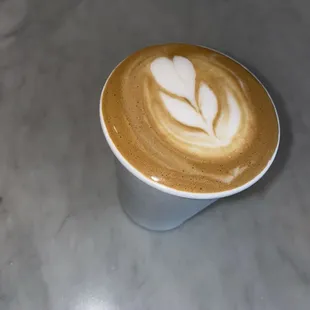 a latte in a cup