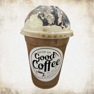 a cup of coffee with whipped cream