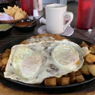 Huevos and papas con chorizo plate