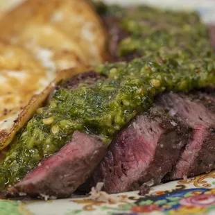 Steak and Eggs with eggs any style, your choice of sauce, and a side of housemade dill rye toast