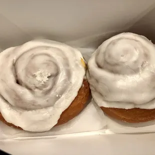 two donuts with icing