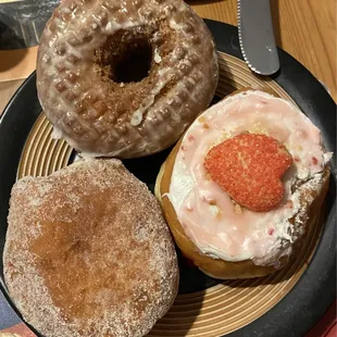 Sour cream cake doughnut; strawberry bomboloni; cheese berry doughnish.