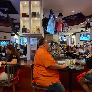 people sitting at the bar