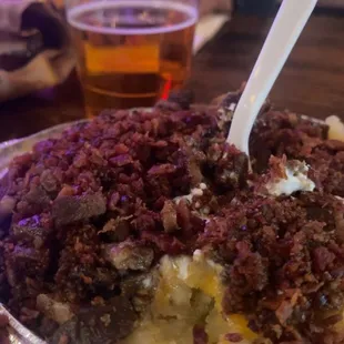 PAPA DE Carne Asada topped with Bacon
