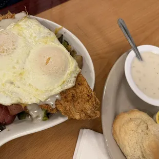 Chicken fried chicken skillet with a side of biscuits and gravy