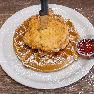 Chicken &amp; Waffles - 2 crispy chicken breasts over waffle. Served with eggs.