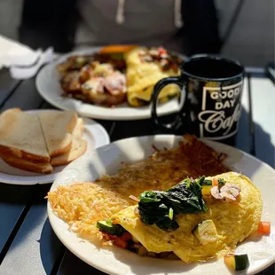 a plate of omelets and a cup of coffee