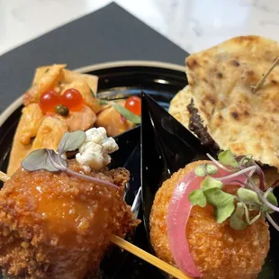 risotto and pork belly balls  The Casso Burger   ceviche style salmon bites  Fried chicken