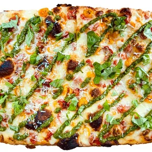 Tri-colored cherry tomatoes, mozzarella and fontina cheese, topped with fresh burrata and pistachio pesto.