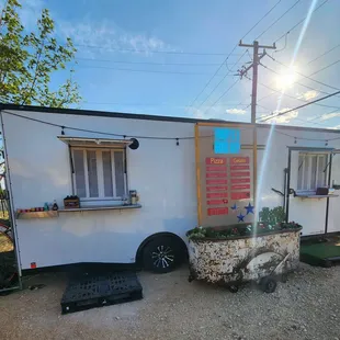 Left side of truck is Good Day Pizza with artisan options. Right side has Gelato that is fluffier than any frozen treat you&apos;ve tasted.