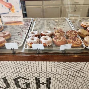 a variety of doughnuts on display
