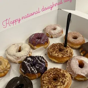 a variety of donuts in a box