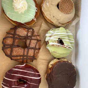 Match Matcha w Vanilla Drizzle, Boston Cream Doughnut (Filled),Blackberry Lemon Doughnut, and others