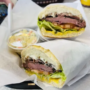 a roast beef sandwich with lettuce