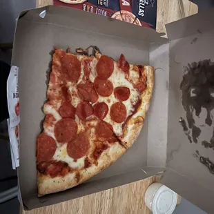 The giant slice !!! My cat sat on the box and the box absorbed all the delicious oils