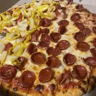 Light sauce, Pepperoni with half added pineapple and banana peppers