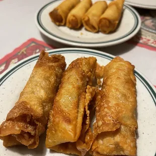 The egg rolls in foreground were filled with ground pork and tasted much better than the spring rolls in the background