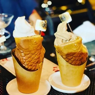 two ice cream cones with marshmallows