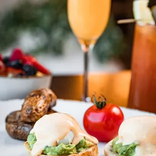 Eggs benedict with choice of bacon, salmon or smashed avocado