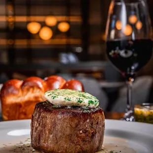 Chef's cut filet mignon certified angus beef, 8 oz, with sauce accompaniments: chimichurri, compound herb butter, beef jus, mushroom cream