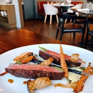 Striploin and Pomme Puree with Pumpkinseed Oil, Roasted Baby Carrots, Trumpet Royal