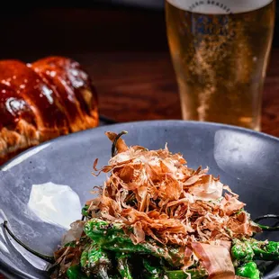 Shishito peppers with miso caramel, togarashi, nori furikake, shaved bonito