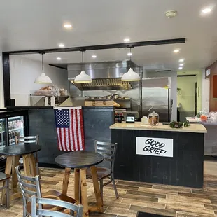 a view of a kitchen and dining area