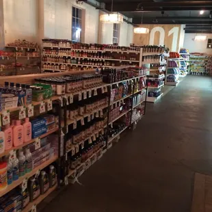 a grocery store with shelves full of goods