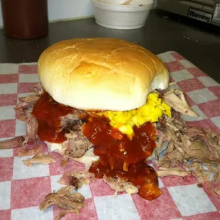 Pit Smoked Pork sandwich, with mustard slaw and BBQ sauce