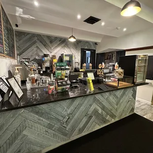a bar with a marble counter top