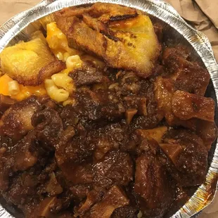 a plate of meat and potatoes