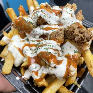 Seasoned fries with, cheese, chicken, Buffalo sauce and ranch.