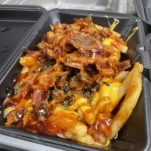 Good Burger Fries with The Good Sauce and Honey BBQ sauce.