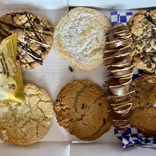 1/2 dozen cookies, Twix popcorn, and a chocolate-covered peanut-butter pretzel thing