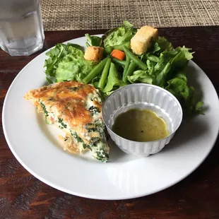 Quiche with fresh salad.