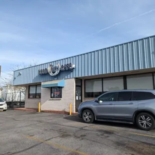 a car parked in front of the building