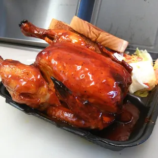 Whole Chicken baked. deep fried and smear in BBQ sauce.