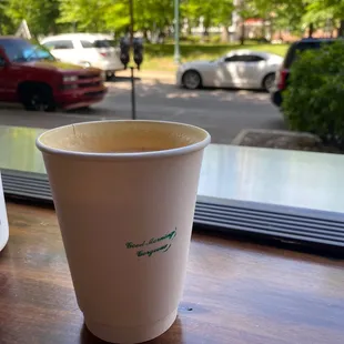 a cup of coffee on a table