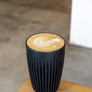 a cup of coffee on a table