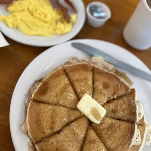 Banana Pancakes with scrambled eggs and hard crispy bacon