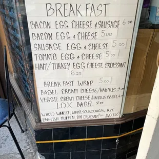 a breakfast menu on the window