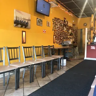 a row of chairs in a restaurant