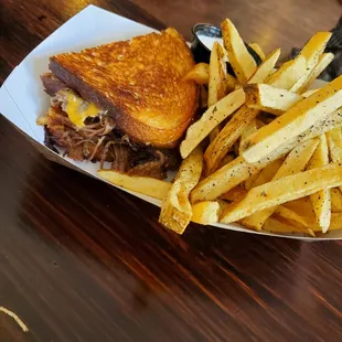 Braised short rib grilled cheese with perfectly crispy but pillowy soft fries
