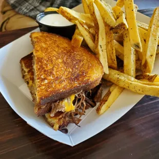 Braised short rib grilled cheese with perfectly crispy but pillowy soft fries