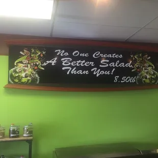 a sign that says no one creates a better salad than you $ 50