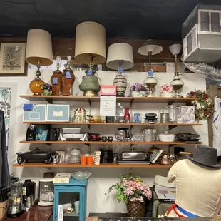 Household items, lamps, cabinet, flowers, kitchen tools, paintings