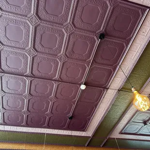 Beautiful purple and green ceilings -- makes for a cozy atmosphere.